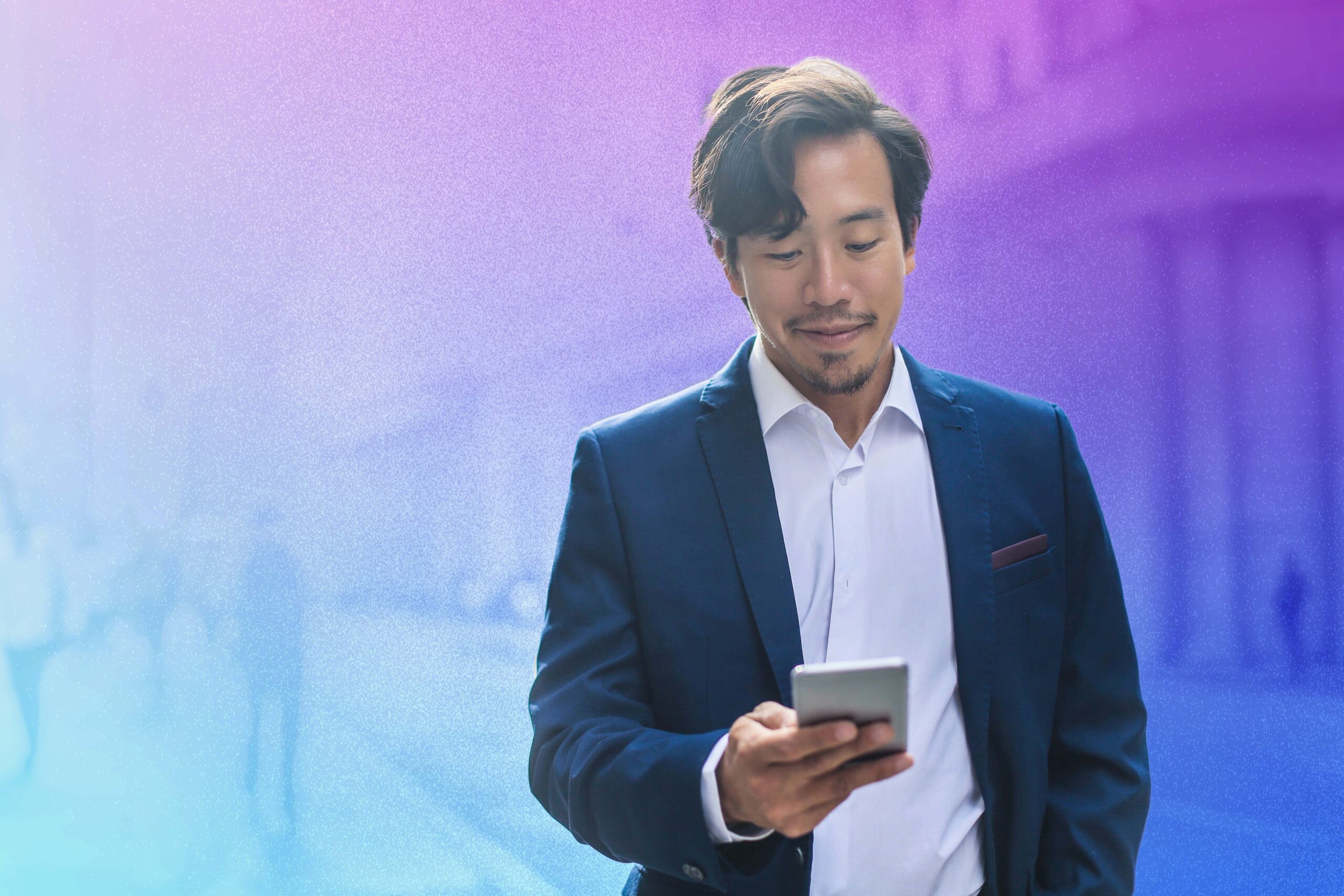 man looking at phone