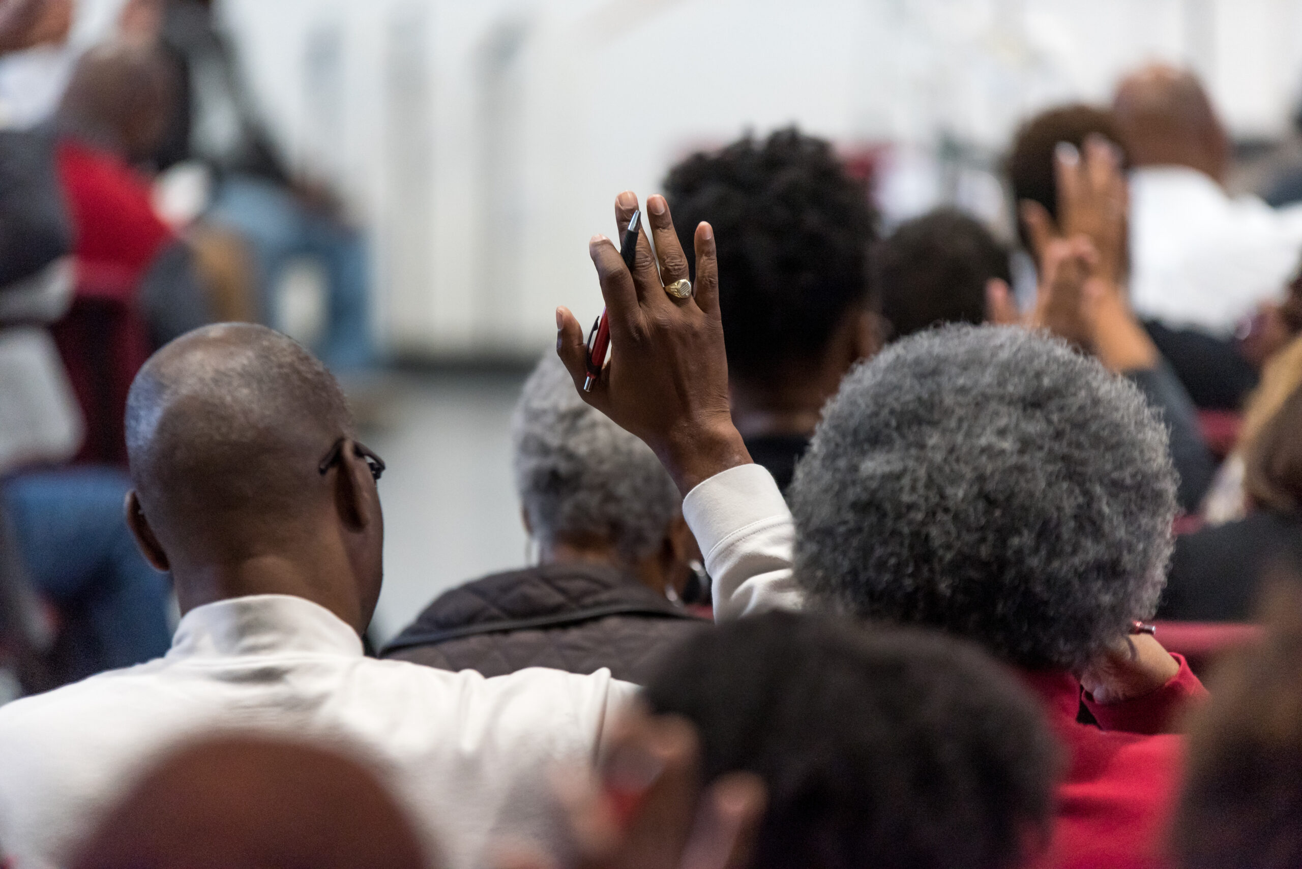 hands raised at church
