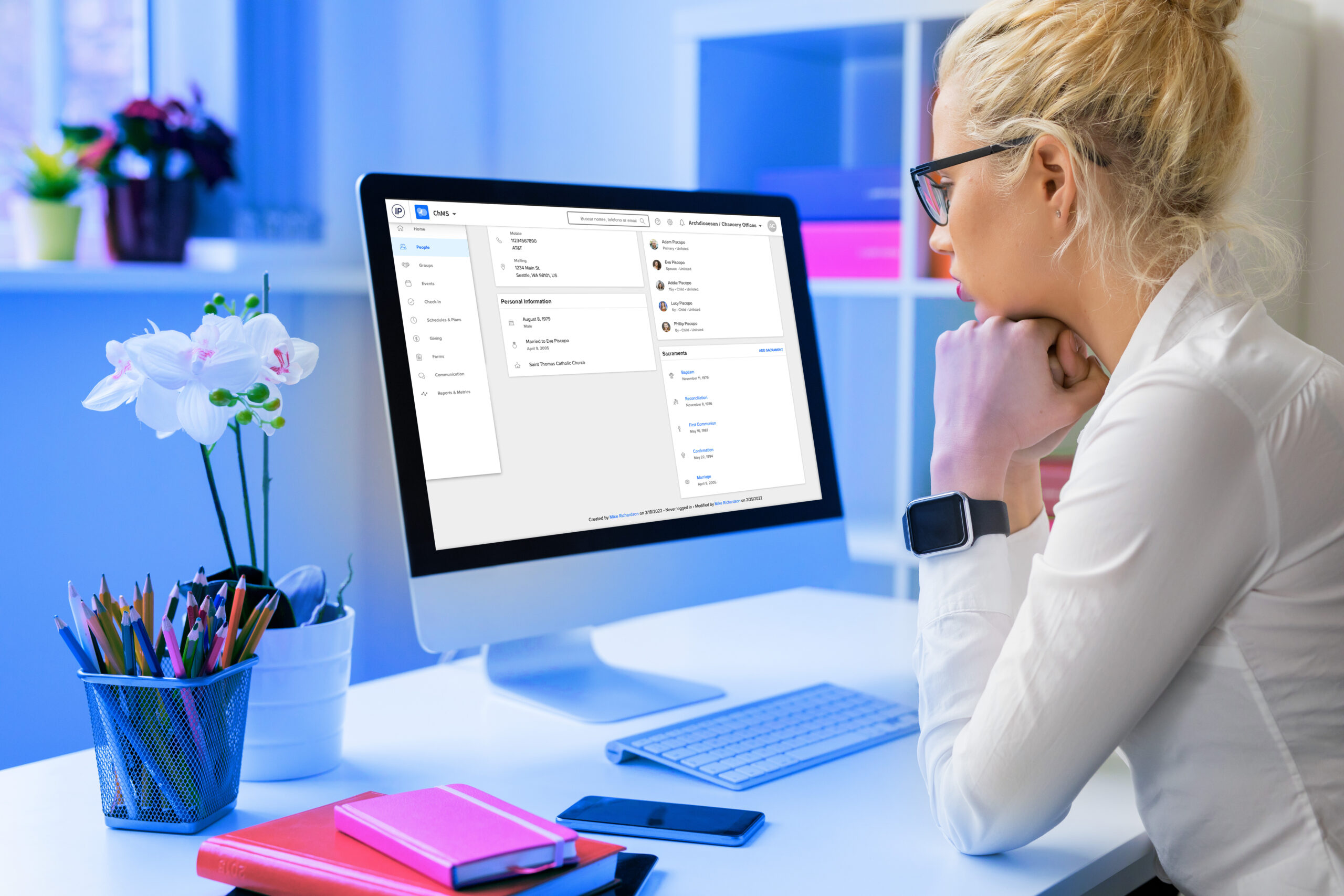 woman looking at Pushpay software on her computer
